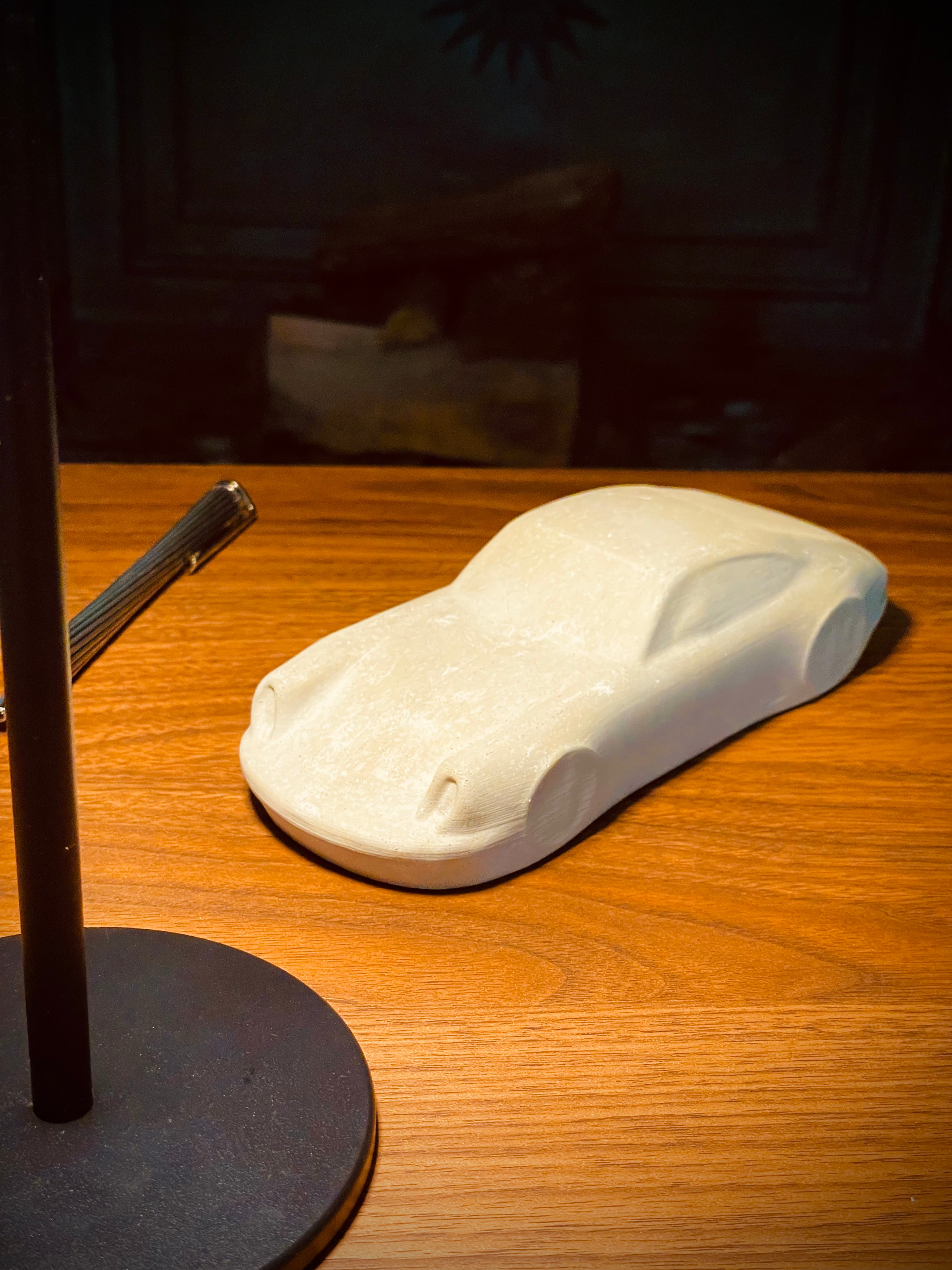 911 Skulptur aus Beton - 19cm in grau